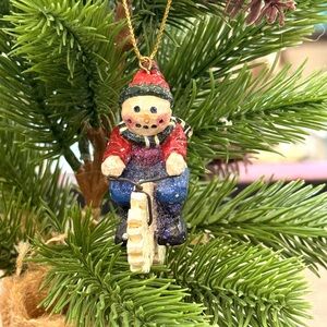 Pam Schifferl Folk Art Snowman on bicycle ornament